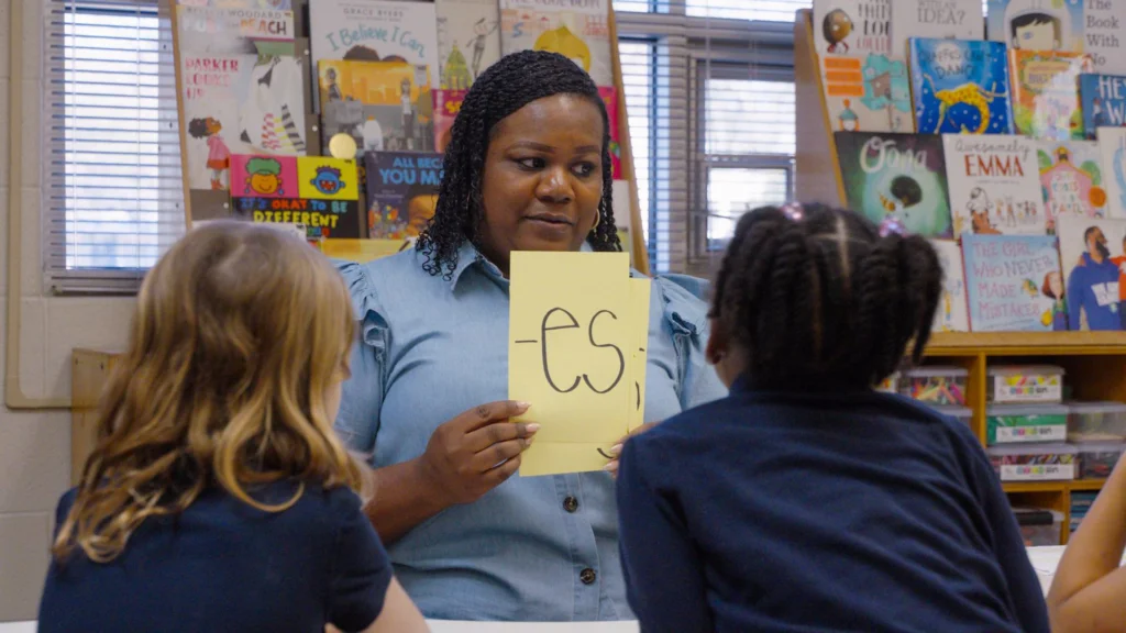 Small group lesson with suffix flash cards.